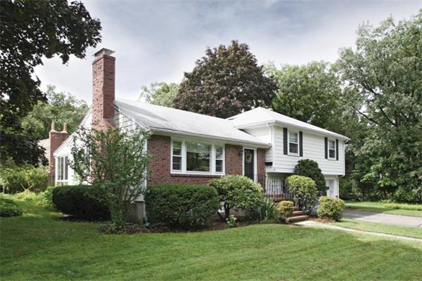 41 Bird Street Needham, MA 02492 - Photo 1 of 6 a front view of house with a garden and yard