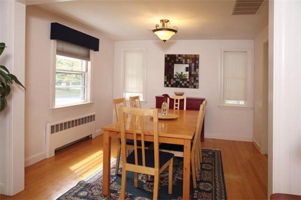 41 Bird Street Needham, MA 02492 - Photo 3 of 6 a view of a dining room with furniture and a window