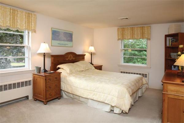 41 Bird Street Needham, MA 02492 - Photo 5 of 6 a bedroom with a bed and a window
