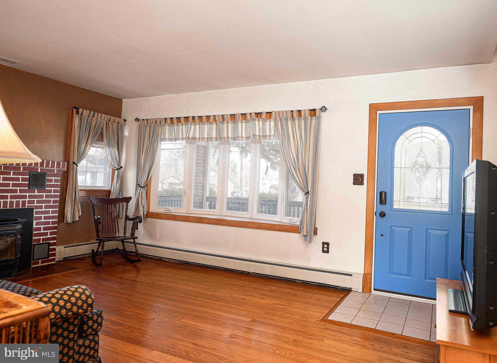 922 Rock Spring Road Bel Air, MD 21014 - Photo 13 of 69 a view of livingroom with furniture wooden floor and windows