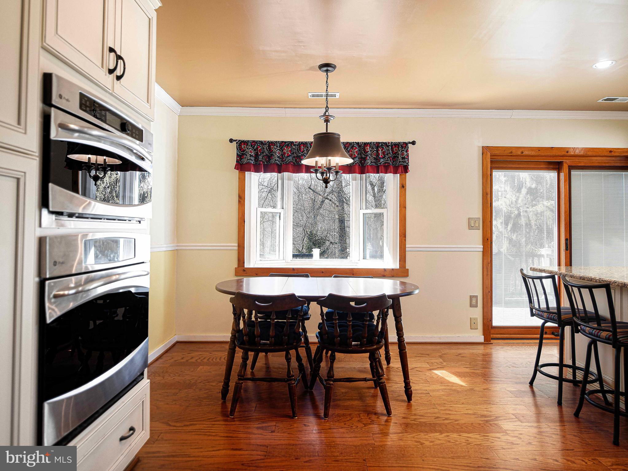 922 Rock Spring Road Bel Air, MD 21014 - Photo 14 of 69 a dining room with furniture window wooden floor