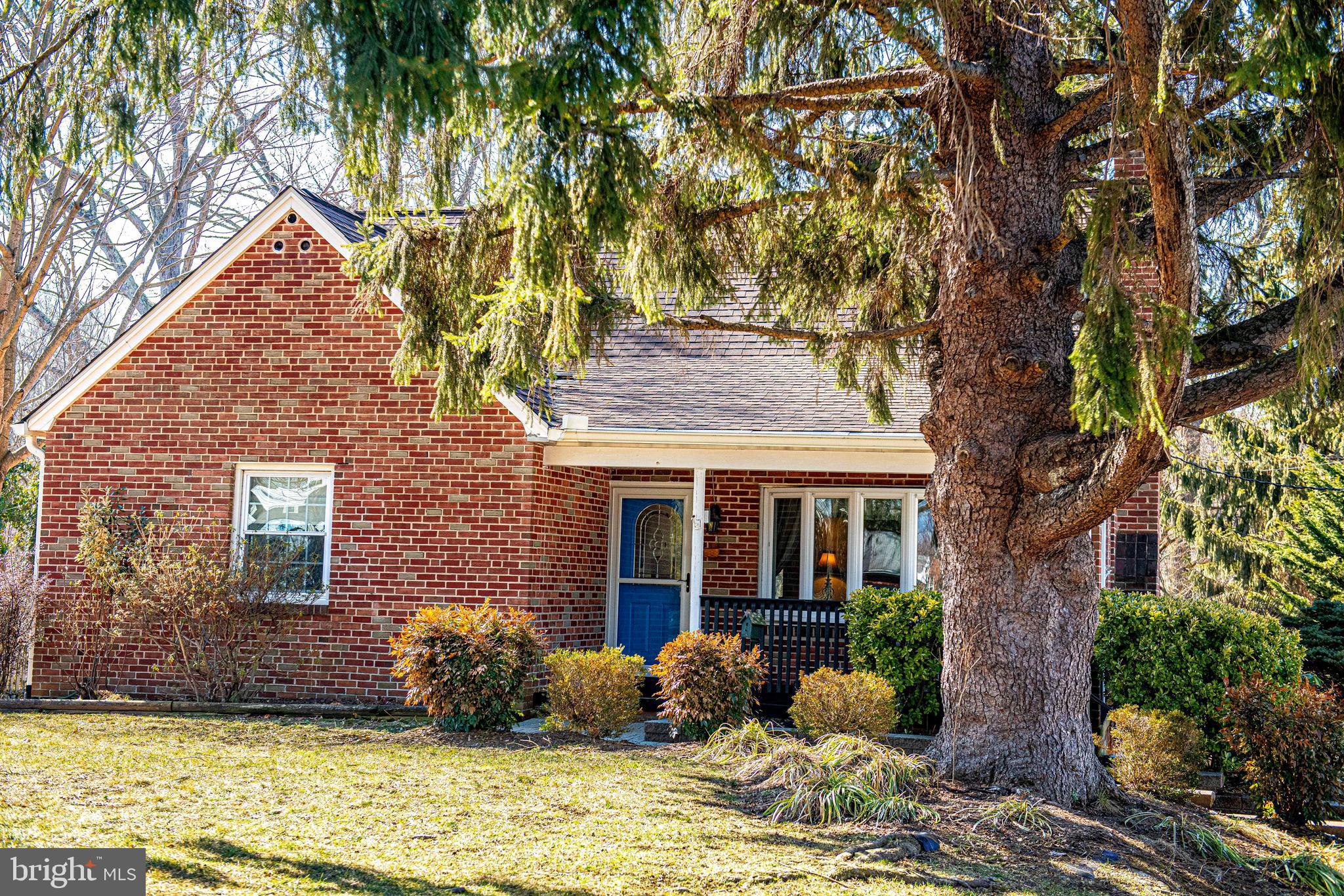 922 Rock Spring Road Bel Air, MD 21014 - Photo 2 of 69 a front view of a house with garden