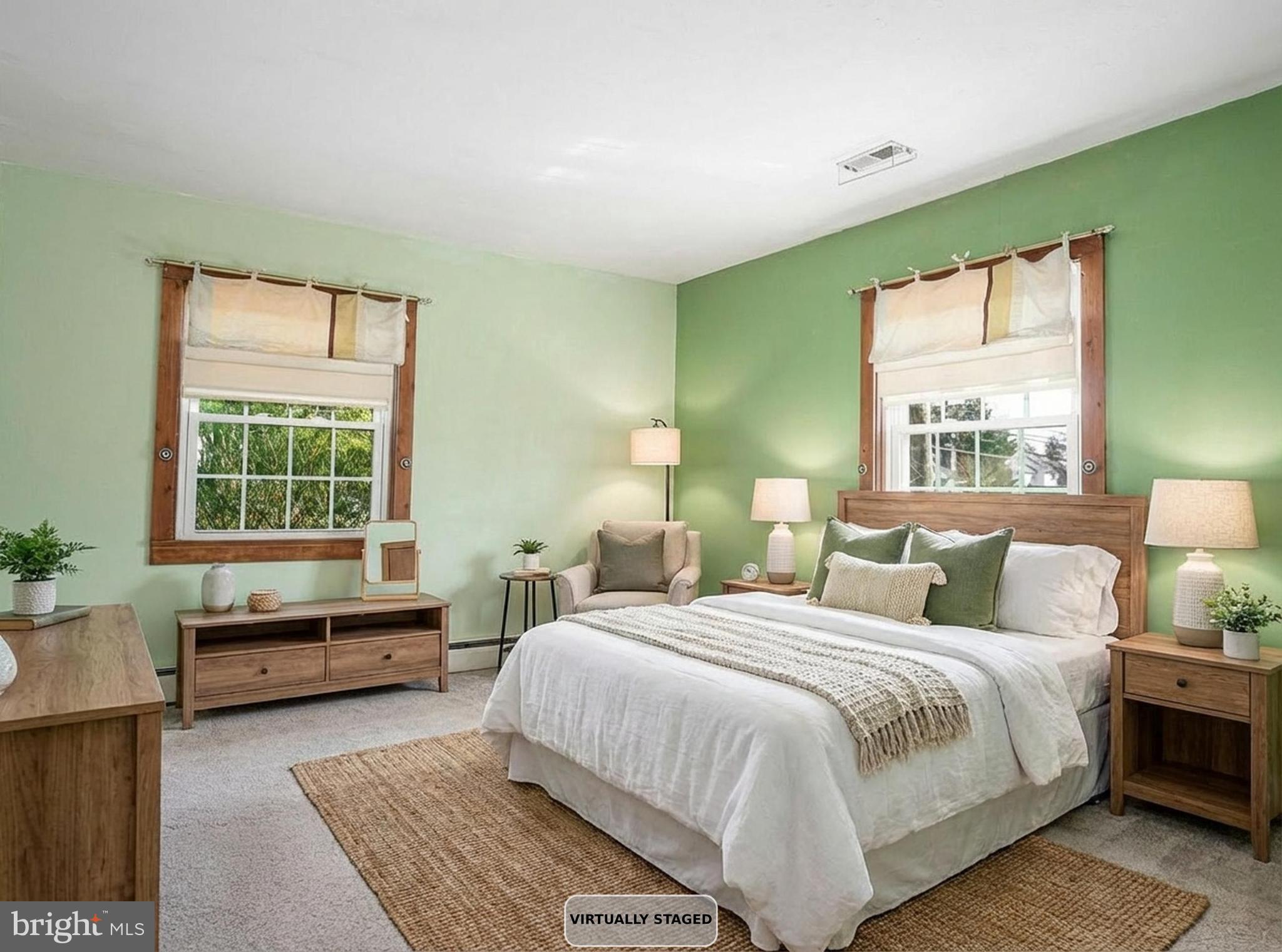 922 Rock Spring Road Bel Air, MD 21014 - Photo 21 of 69 a bedroom with a large bed and a window