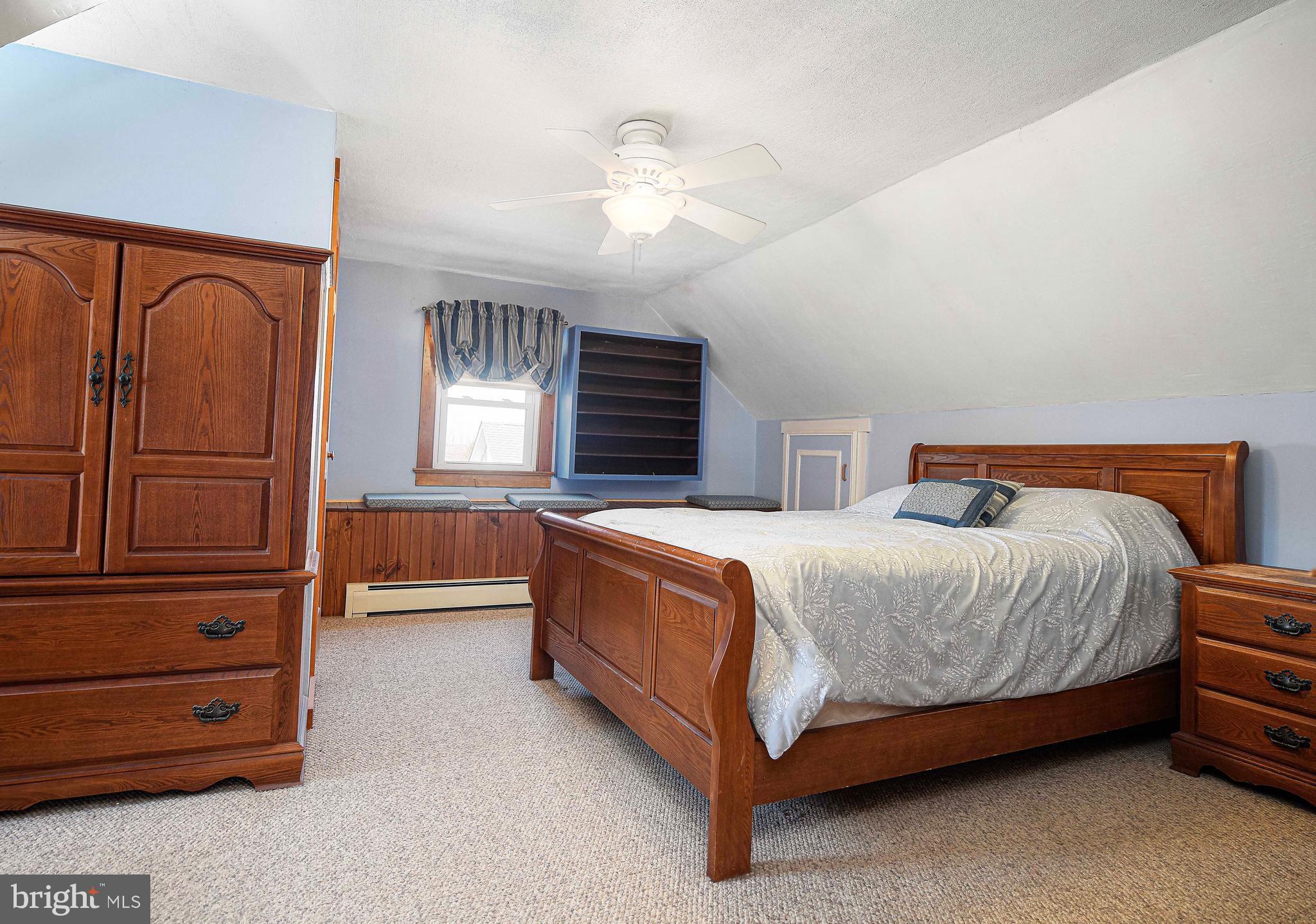 922 Rock Spring Road Bel Air, MD 21014 - Photo 27 of 69 a spacious bedroom with a bed and cabinet