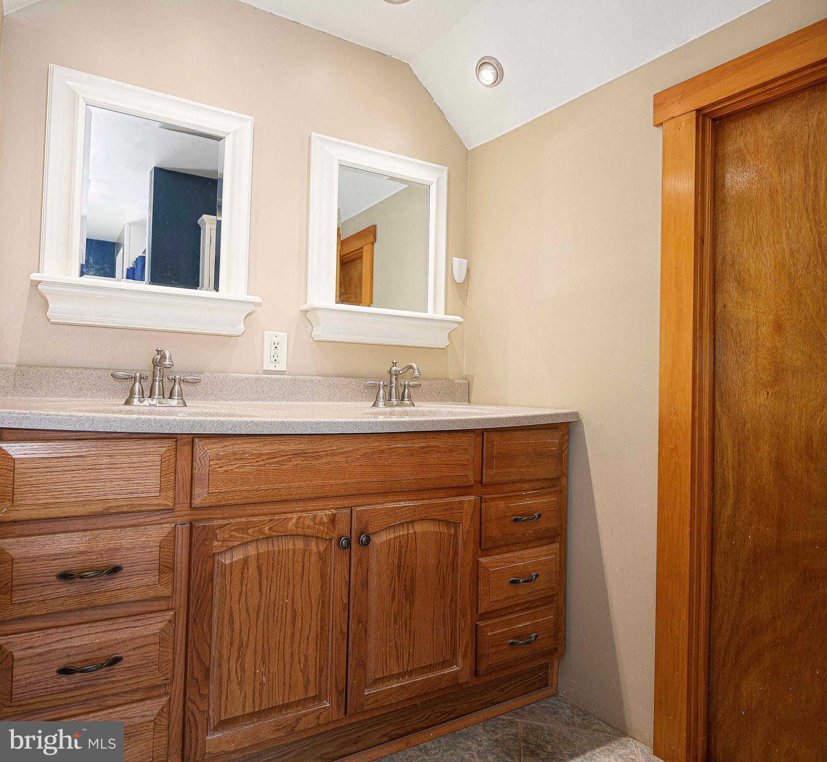 922 Rock Spring Road Bel Air, MD 21014 - Photo 28 of 69 a bathroom with a sink vanity and mirror