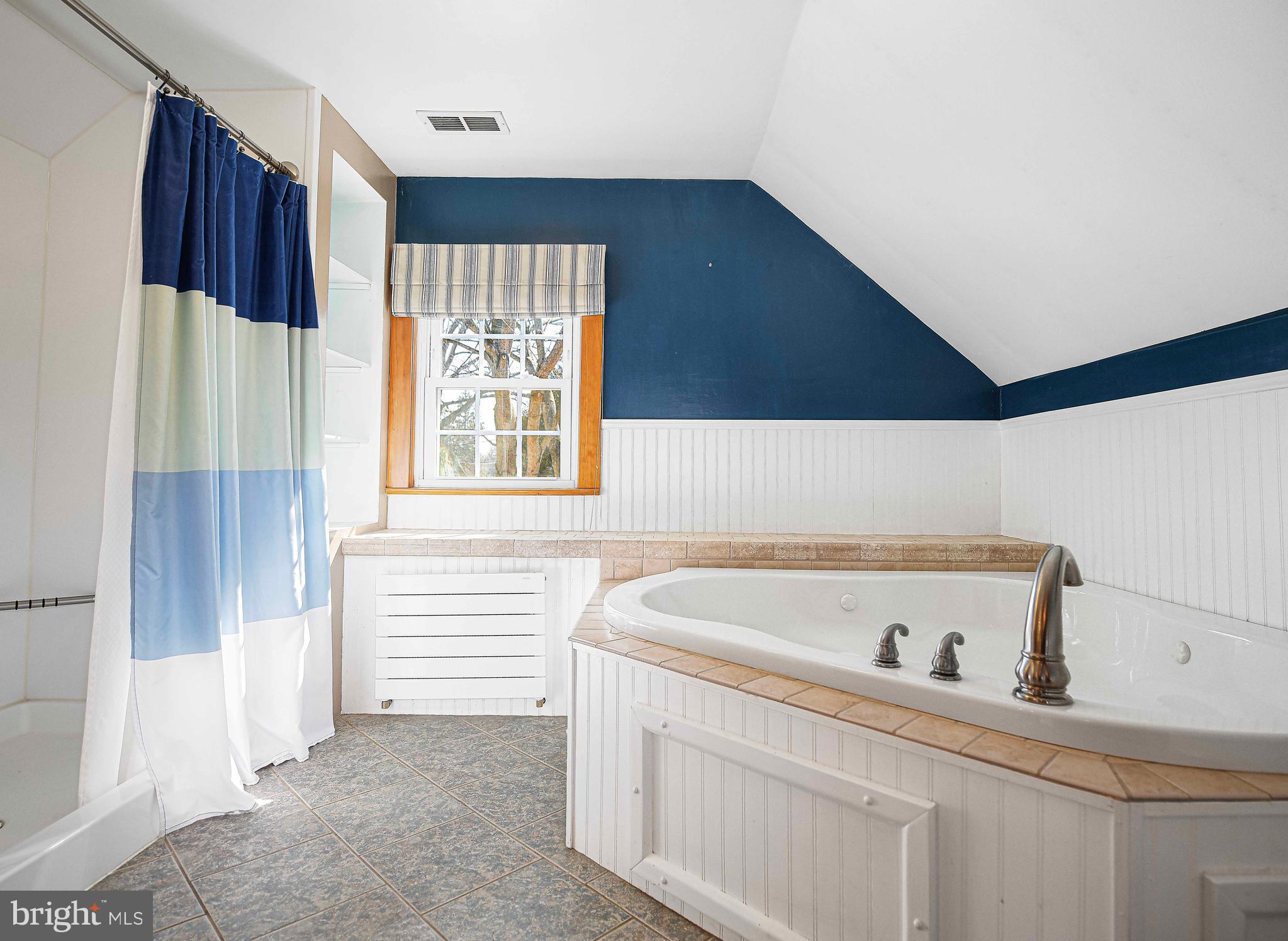 922 Rock Spring Road Bel Air, MD 21014 - Photo 29 of 69 a view of washer and dryer with kitchen in the background