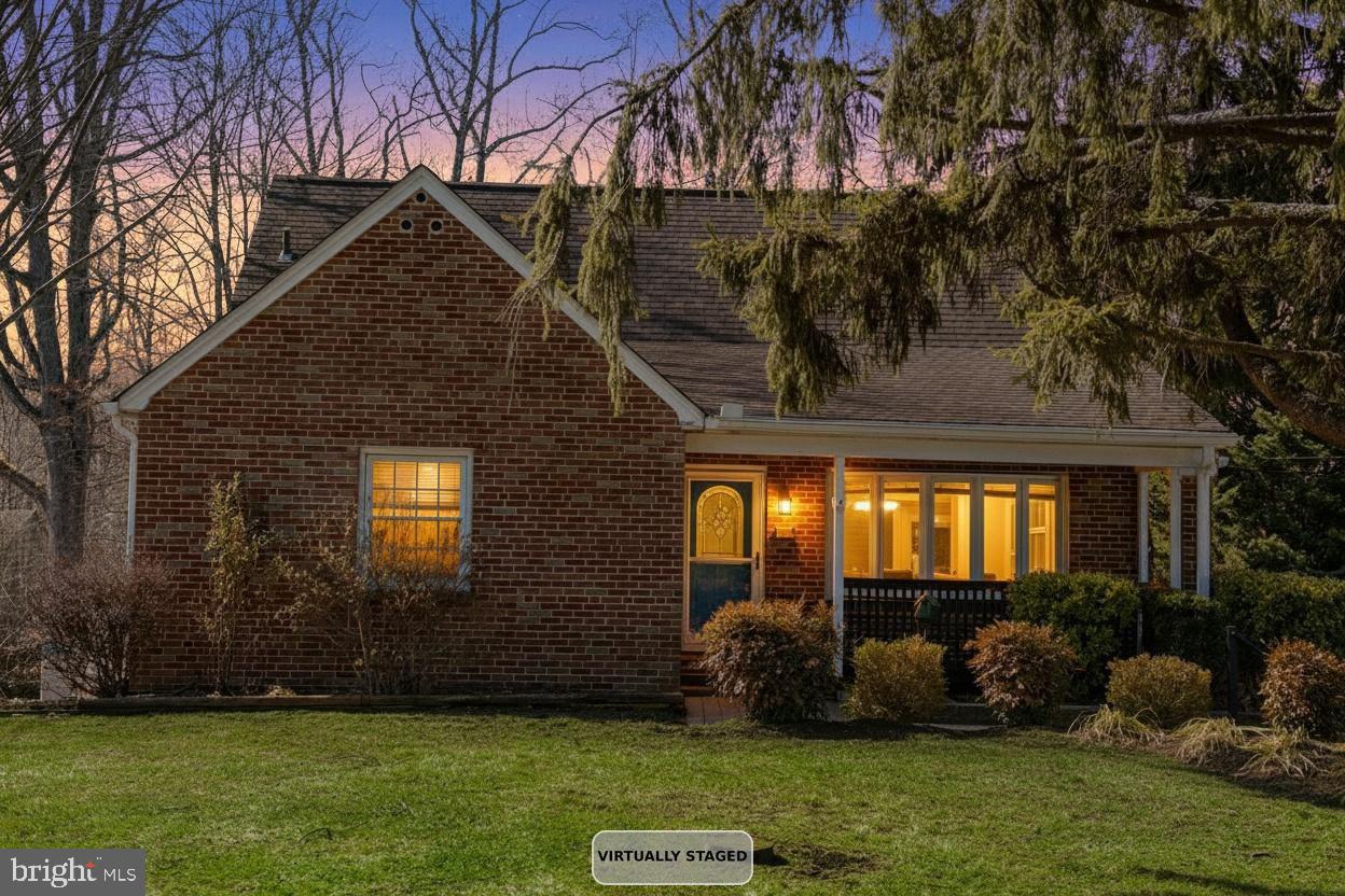 922 Rock Spring Road Bel Air, MD 21014 - Photo 3 of 69 a front view of a house with a yard