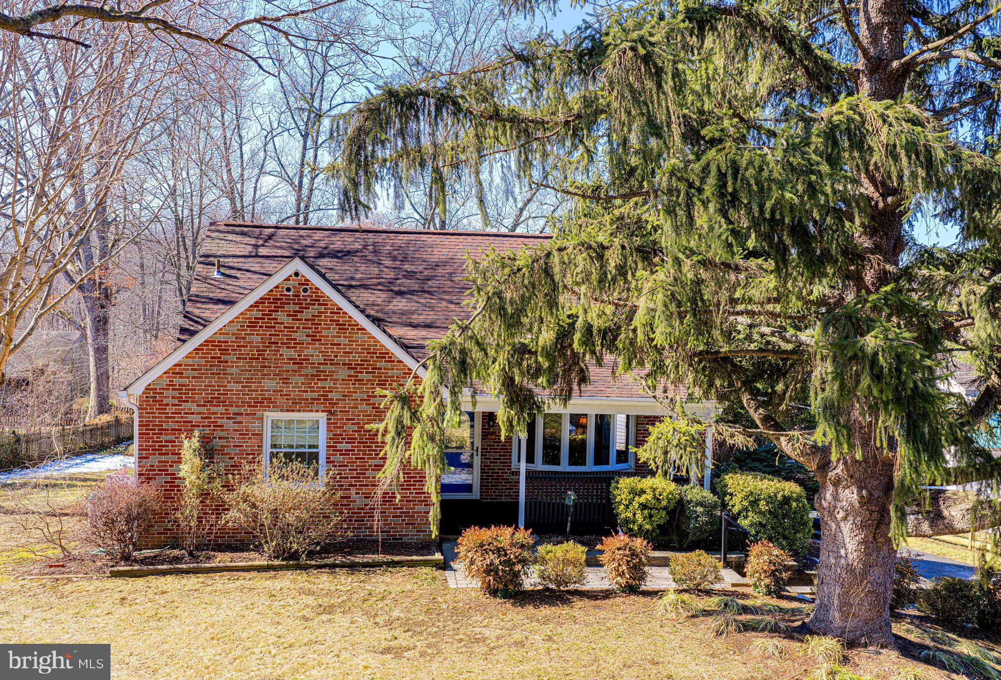 922 Rock Spring Road Bel Air, MD 21014 - Photo 48 of 69 a front view of a house with a yard