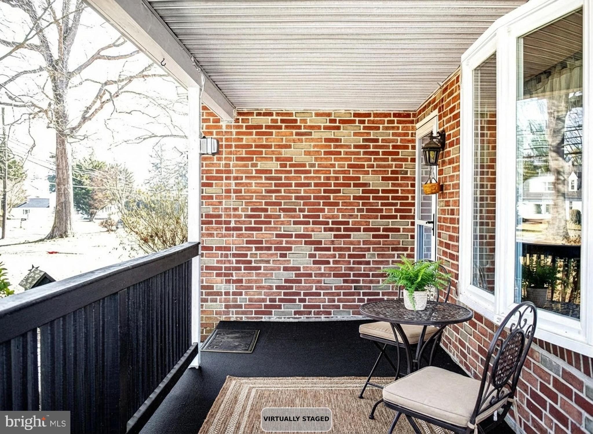 922 Rock Spring Road Bel Air, MD 21014 - Photo 7 of 69 a view of balcony with a couple of chairs