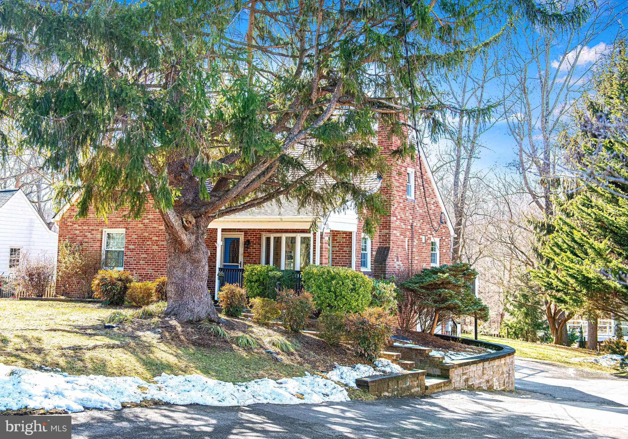 922 Rock Spring Road Bel Air, MD 21014 - Photo 8 of 69 a front view of a house with a yard