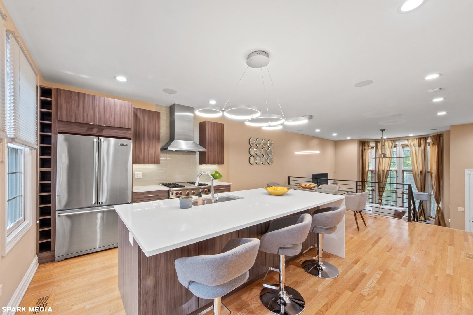 18 North Ada Street, Unit C Chicago, IL 60607 - Photo 11 of 28 a kitchen with a table chairs refrigerator and microwave