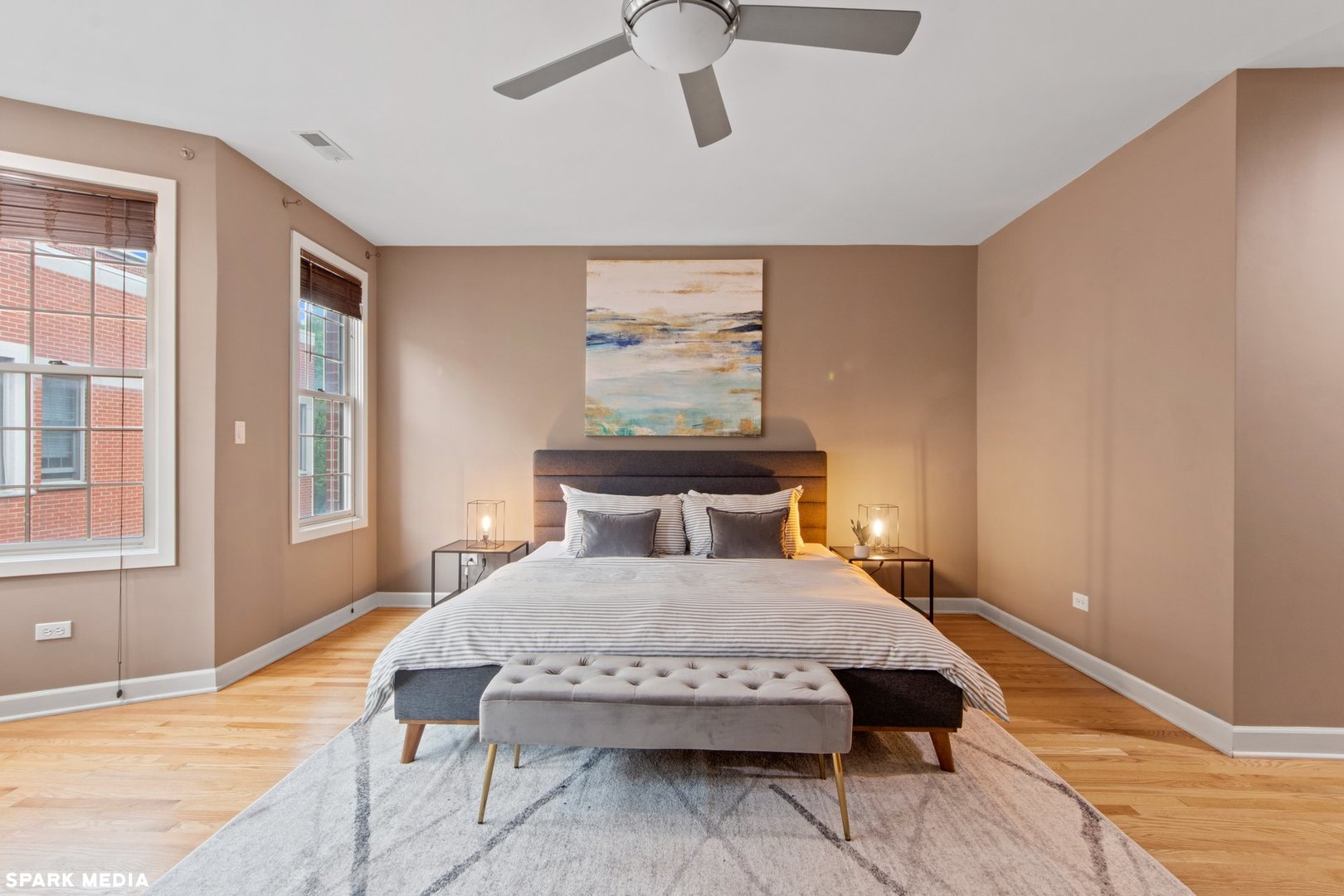 18 North Ada Street, Unit C Chicago, IL 60607 - Photo 16 of 28 a bedroom with a bed and wooden floor