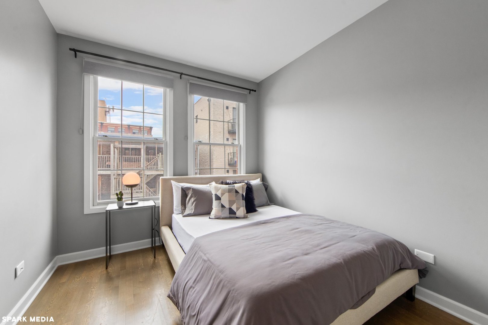 18 North Ada Street, Unit C Chicago, IL 60607 - Photo 21 of 28 a bedroom with a bed and a window