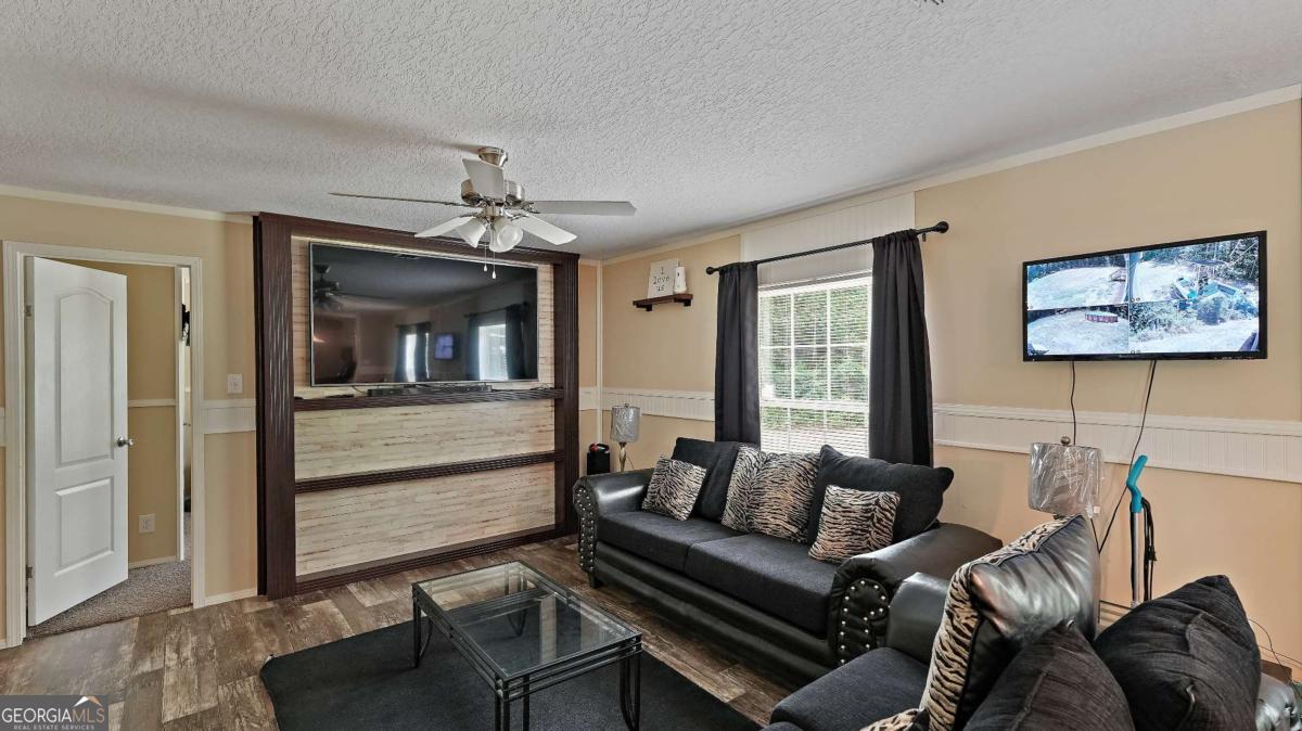 64 Sierra Road Jesup, GA 31545 - Photo 10 of 22 a living room with furniture and a window