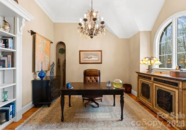 a view of a workspace with furniture