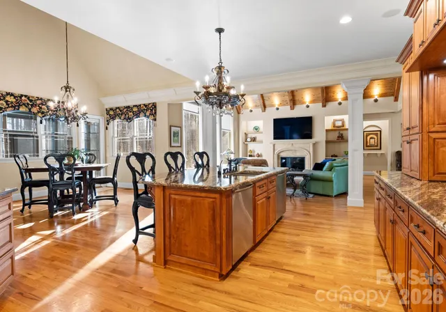 a large white kitchen with lots of counter top space