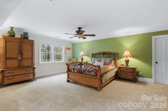 a bathroom with a granite countertop sink a mirror and a shower