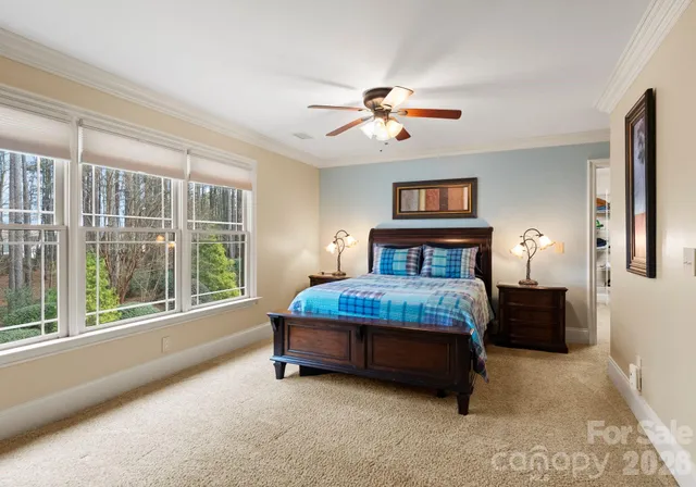 a bathroom with a double vanity sink mirror and shower