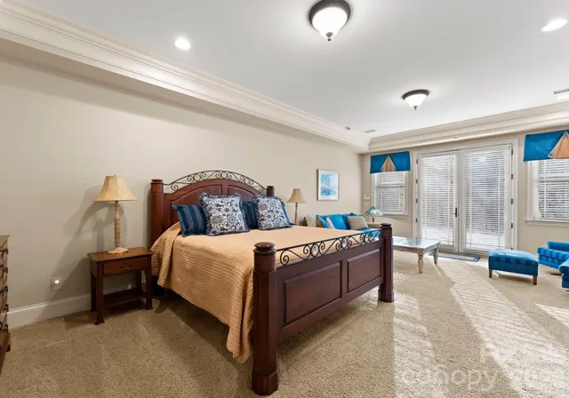 a view of a patio with a table and chairs