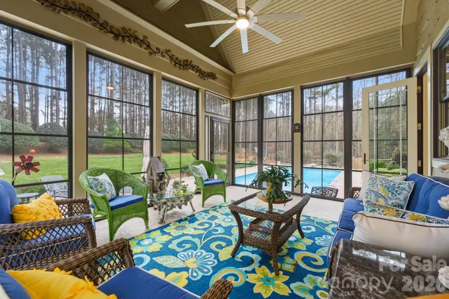 a view of a house with swimming pool