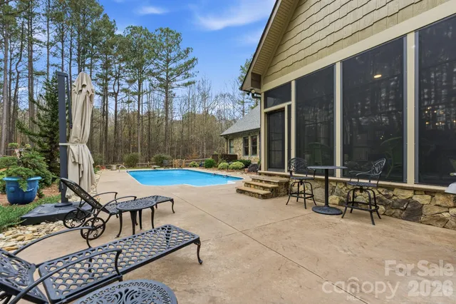 a view of outdoor space yard swimming pool and patio