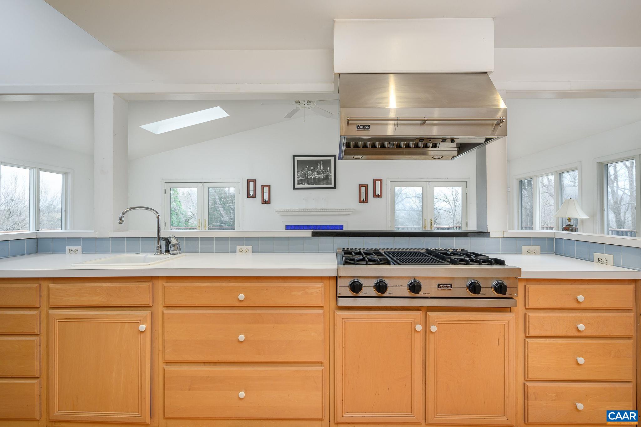 9165 Dick Woods Road Afton, VA 22920 - Photo 13 of 56 a stove top oven sitting inside of a kitchen