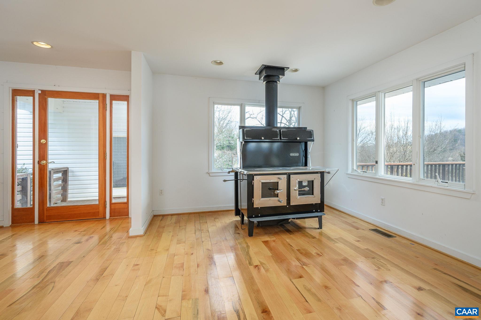 9165 Dick Woods Road Afton, VA 22920 - Photo 15 of 56 a bedroom with furniture and a window
