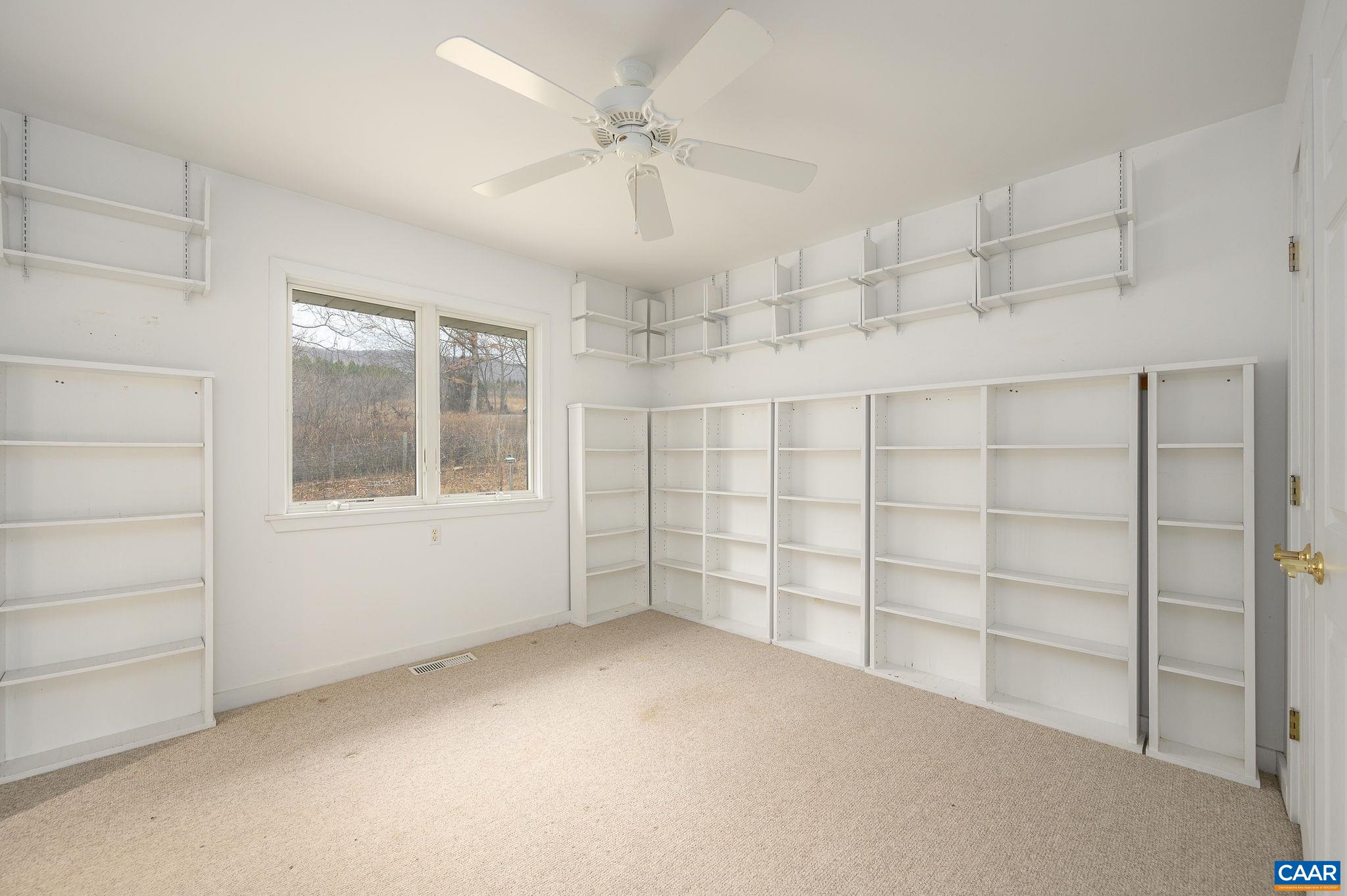 9165 Dick Woods Road Afton, VA 22920 - Photo 18 of 56 a view of an empty room with a window