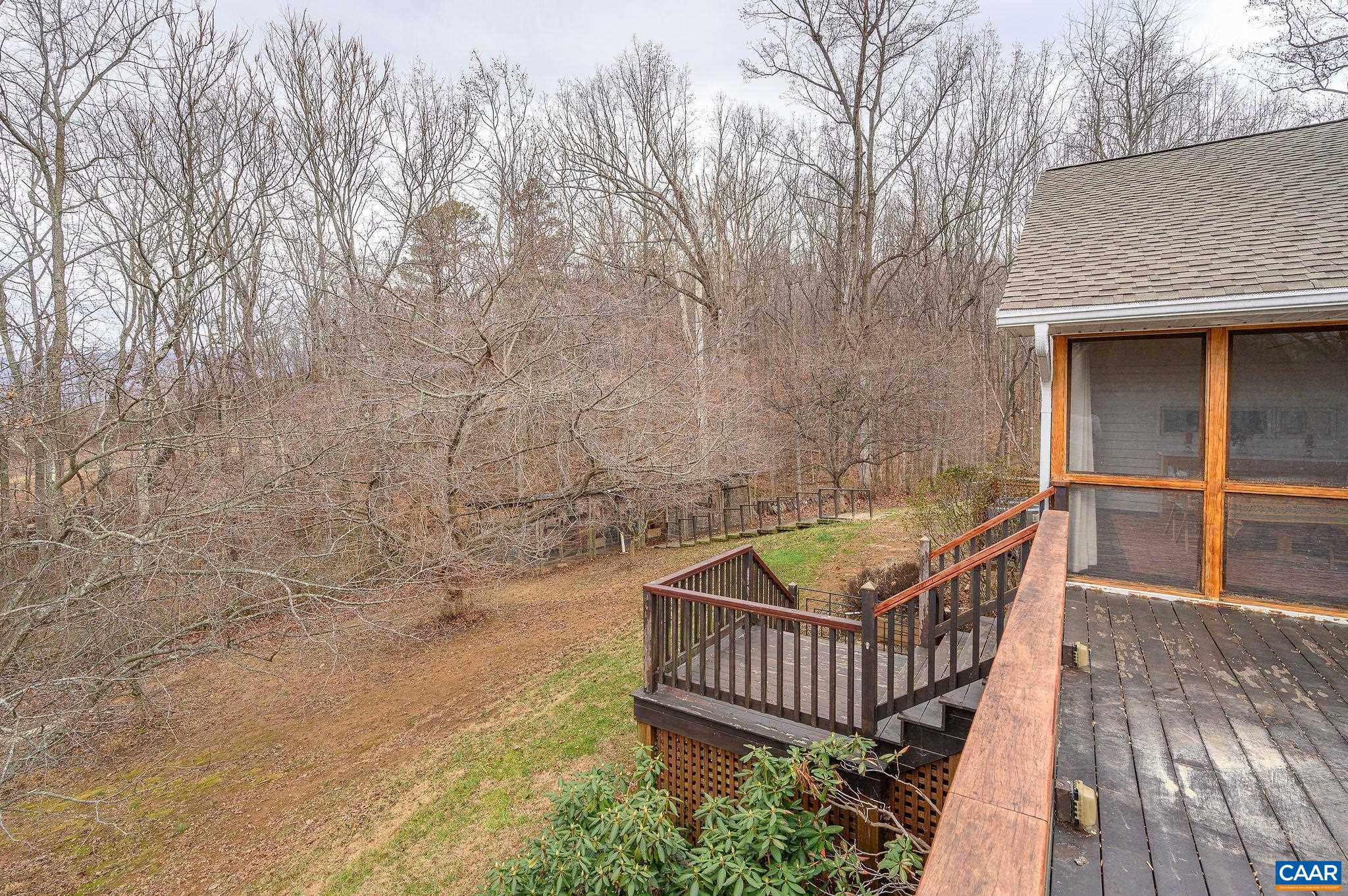 9165 Dick Woods Road Afton, VA 22920 - Photo 33 of 56 a view of backyard with deck and wooden floor
