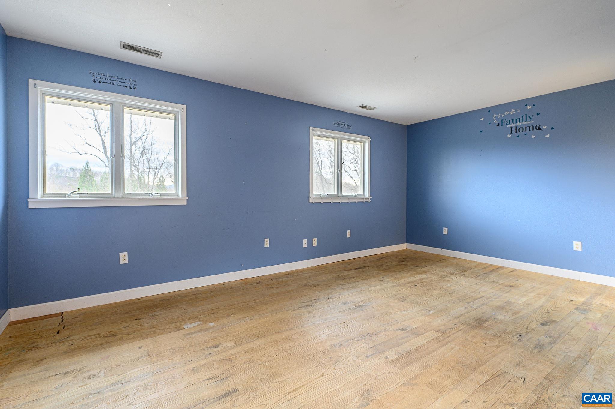 9165 Dick Woods Road Afton, VA 22920 - Photo 36 of 56 a view of an empty room with a window