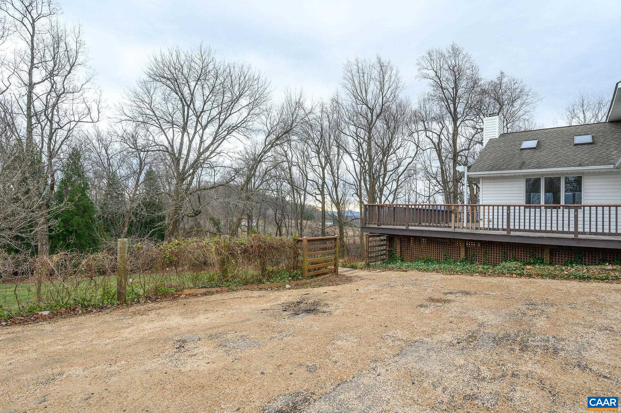 9165 Dick Woods Road Afton, VA 22920 - Photo 45 of 56 a view of house with swimming pool and trees in the background