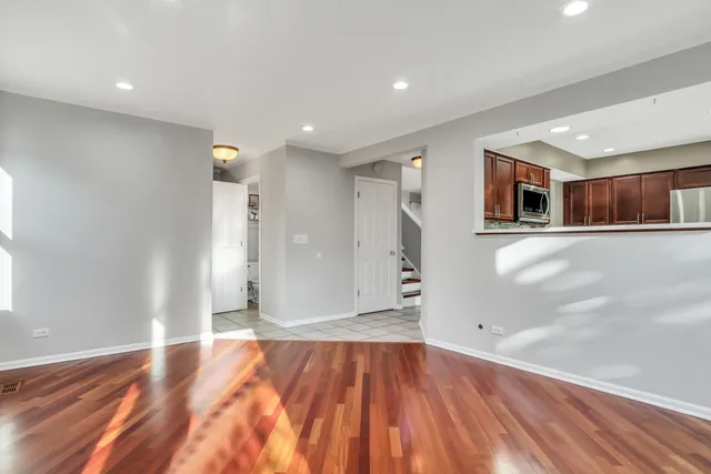a view of a livingroom with wooden floor