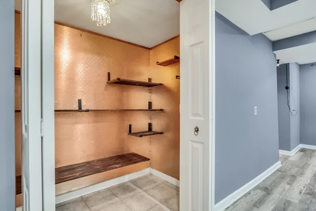 a bathroom with a glass shower door