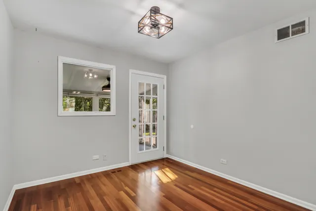 a view of an empty room and window