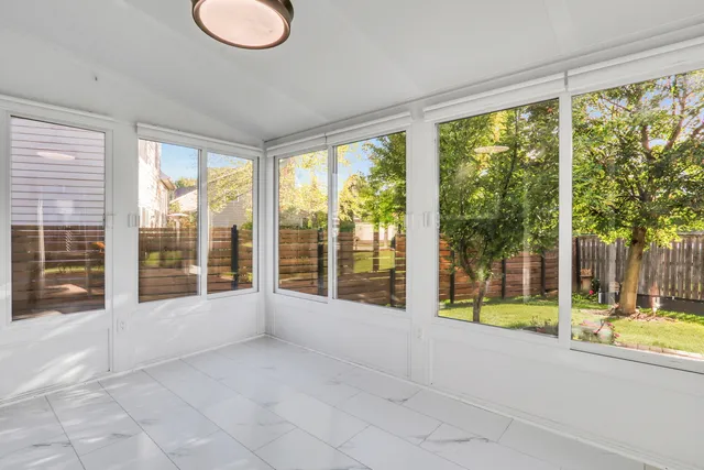 a view of room with window and floor to ceiling window