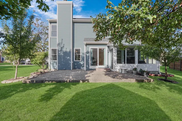 a black and white photo of a bench