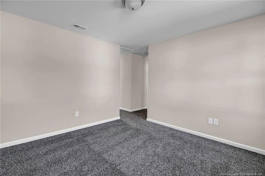64 Onslow Court Spring Lake, NC 28390 - Photo 26 of 37 a view of an empty room