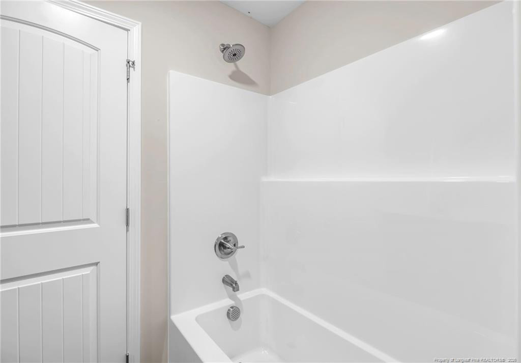 64 Onslow Court Spring Lake, NC 28390 - Photo 28 of 37 a bathroom with a bathtub