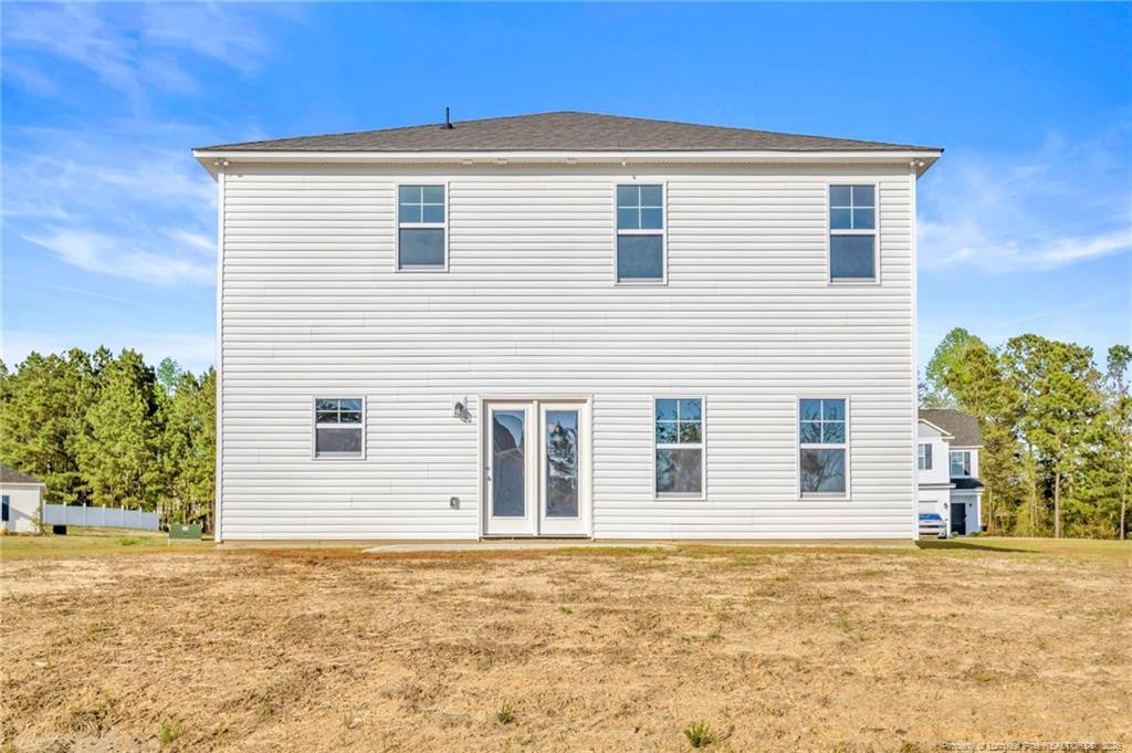 64 Onslow Court Spring Lake, NC 28390 - Photo 35 of 37 a front view of a house with a yard