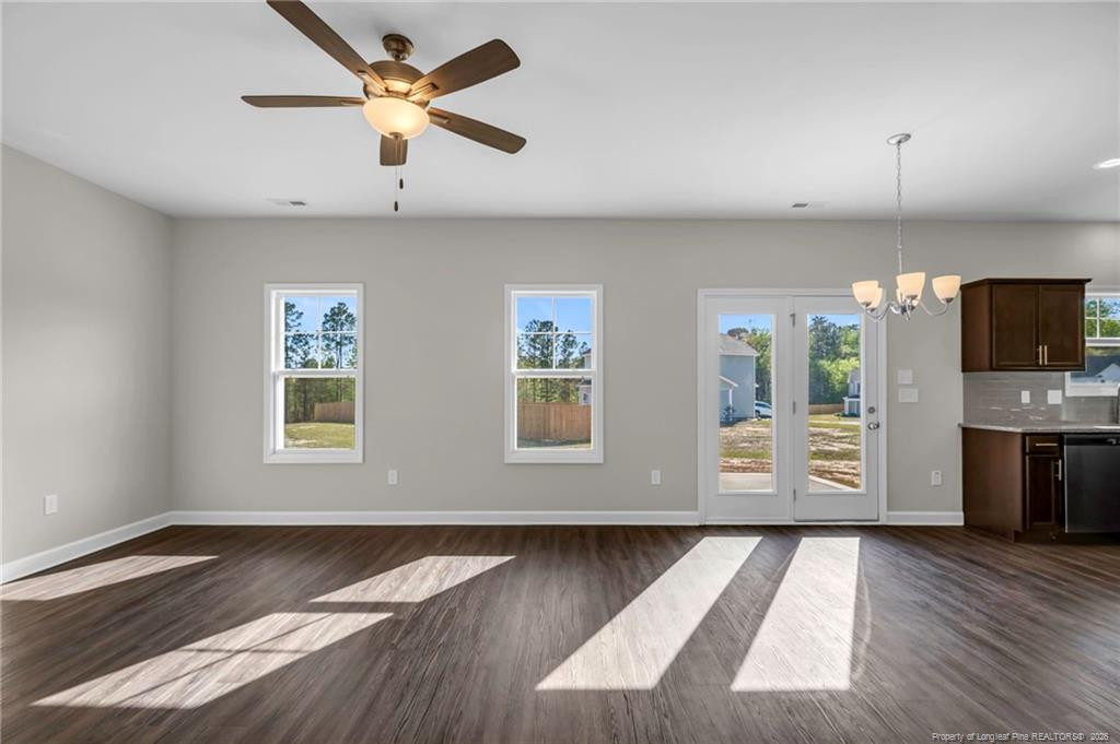 64 Onslow Court Spring Lake, NC 28390 - Photo 7 of 37 a view of an empty room with a kitchen and a window