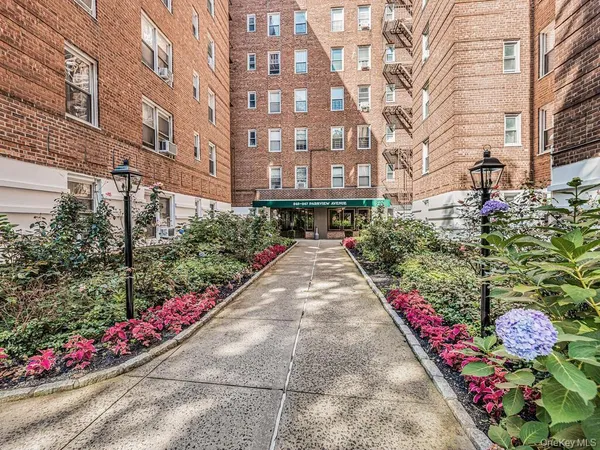 a front view of a multi story residential apartment building