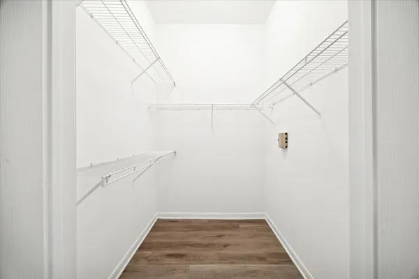 a view of a room with racks on the wall