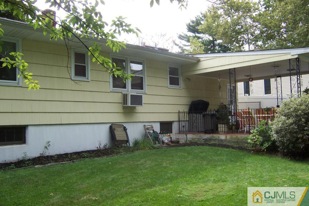 35 Hillcrest Road Colonia, NJ 07067 - Photo 16 of 17 a view of a house with backyard