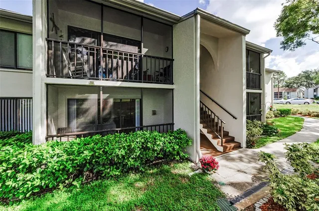 $199,000 | 2575 Pine Ridge Way South, Unit E1, Palm Harbor, FL 34684