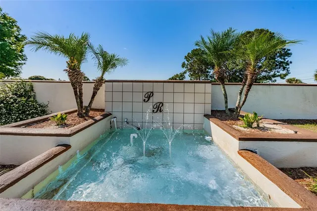 $199,000 | 2575 Pine Ridge Way South, Unit E1, Palm Harbor, FL 34684