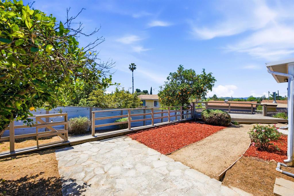 421 Hillcrest Lane Fallbrook, CA 92028 - Photo 21 of 32 a view of backyard with seating area and trees