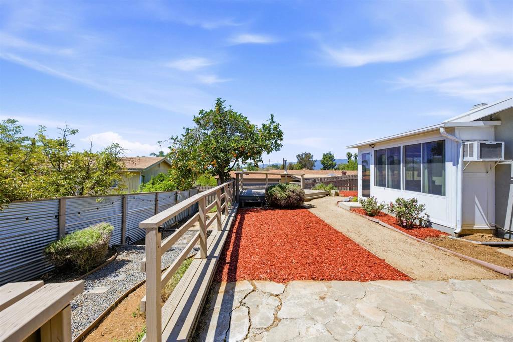 421 Hillcrest Lane Fallbrook, CA 92028 - Photo 22 of 32 a view of an chairs and tables in the patio