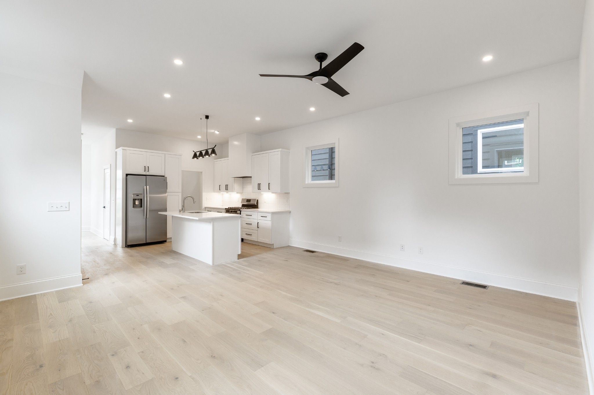 2012 Owen Street, Unit A Nashville, TN 37208 - Photo 15 of 32 a view of a kitchen with a sink and microwave