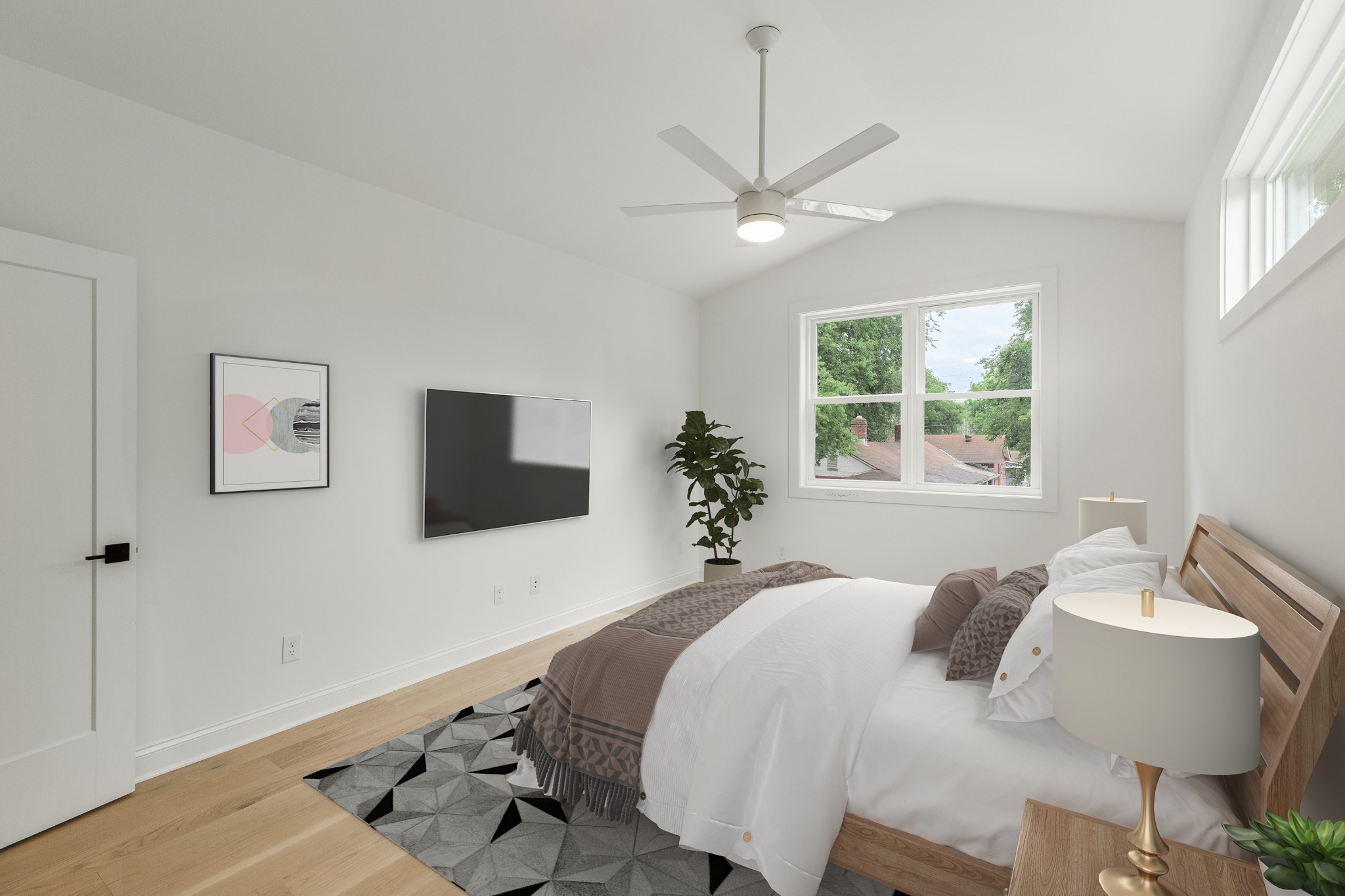 2012 Owen Street, Unit A Nashville, TN 37208 - Photo 21 of 32 a bedroom with a bed and a flat screen tv