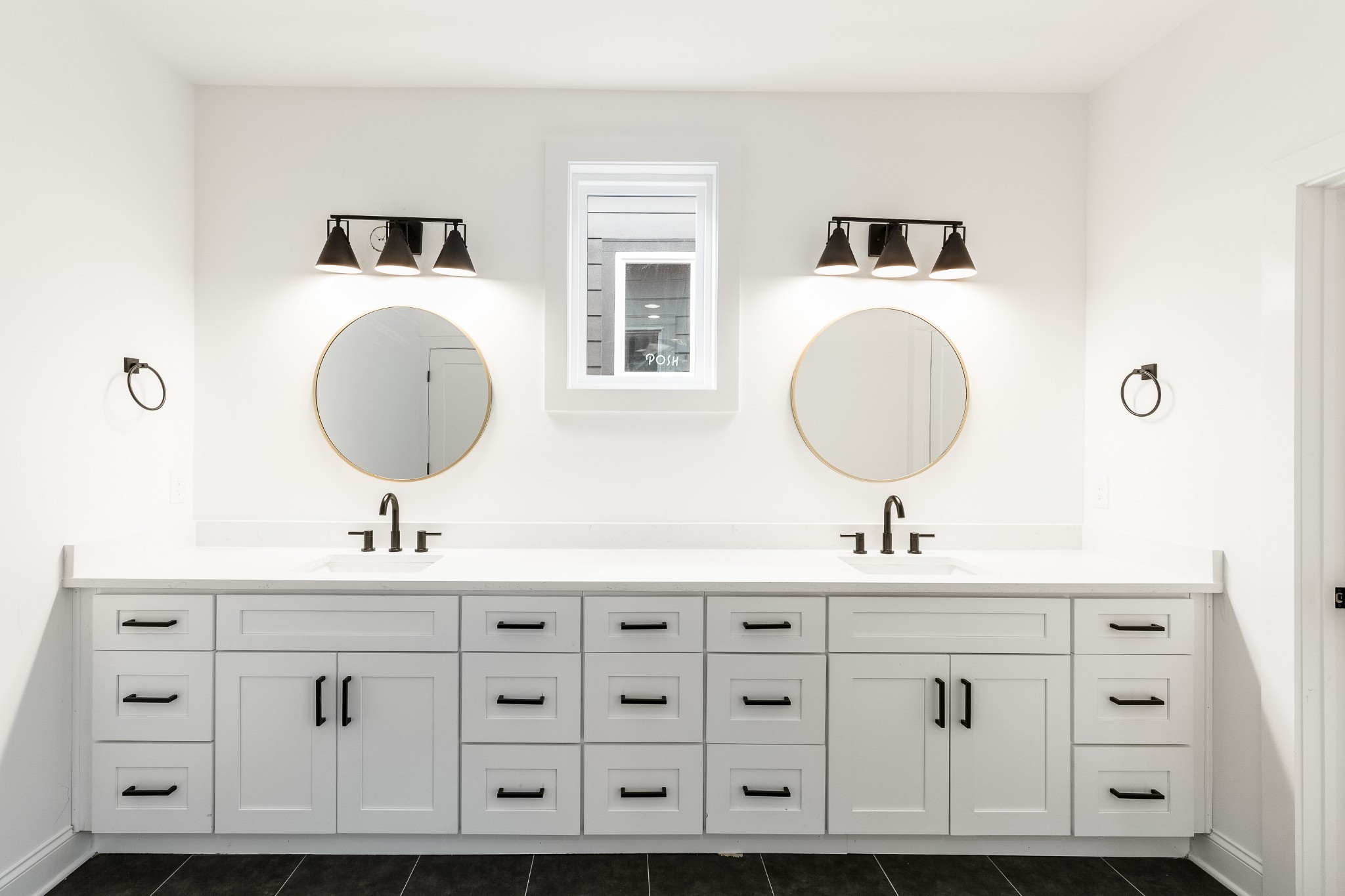 2012 Owen Street, Unit A Nashville, TN 37208 - Photo 23 of 32 a bathroom with a double vanity sink mirror and